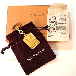 Louis Vuitton Goldtone Metal Malletier 1854 Key Chain Collector's Piece